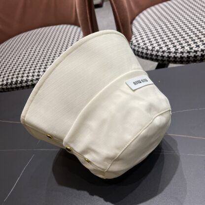 Miu Miu Simple and stylish bucket hat - Image 10