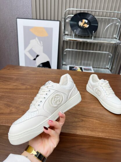 Gucci low-top distressed sneakers - Image 10