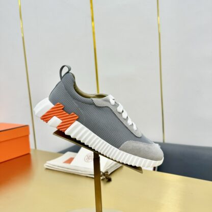 Hermès Spring and Summer Gray and Orange Colorblock Couple Classic Sports Casual Shoes - Image 9
