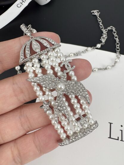Chanel Silver Bird Full Diamond Pearl Necklace - Image 7