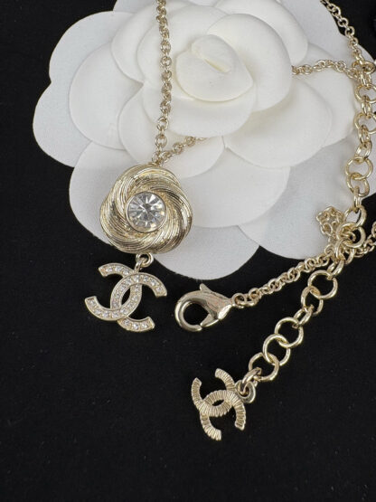 Chanel Gold Rotating Thread Double C Pendant Necklace