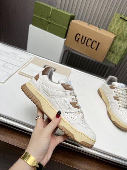 Gucci high and low top distressed sneakers - Image 9