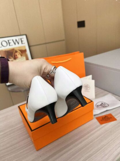 Hermès white loafers are a must-have for holiday wear - Image 9